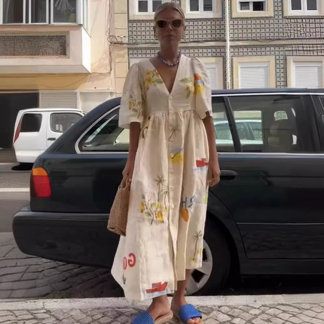 Dame afslappet maxikjole med blomstertryk og knapdetaljer Stilla