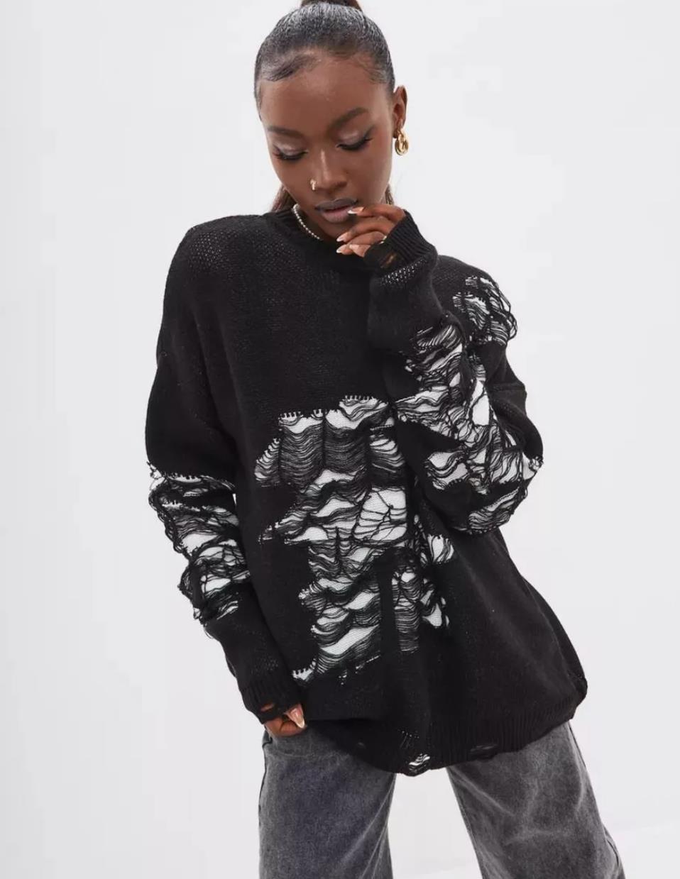 Damer groft strikket oversized sweater med unik transparensstruktur og moderne accenter Stilla