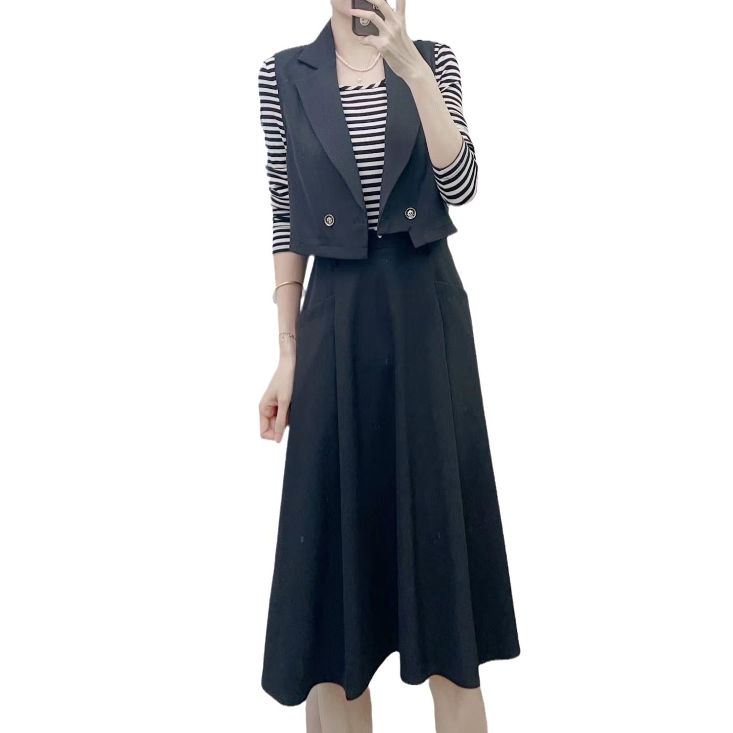 Dame Blazer-jumpsuit kombination med en smart, ubrudt nederdel og stilfulde detaljer Stilla