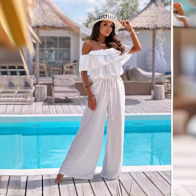 Damejumpsuit med off-shoulder design og bredt ben Stilla