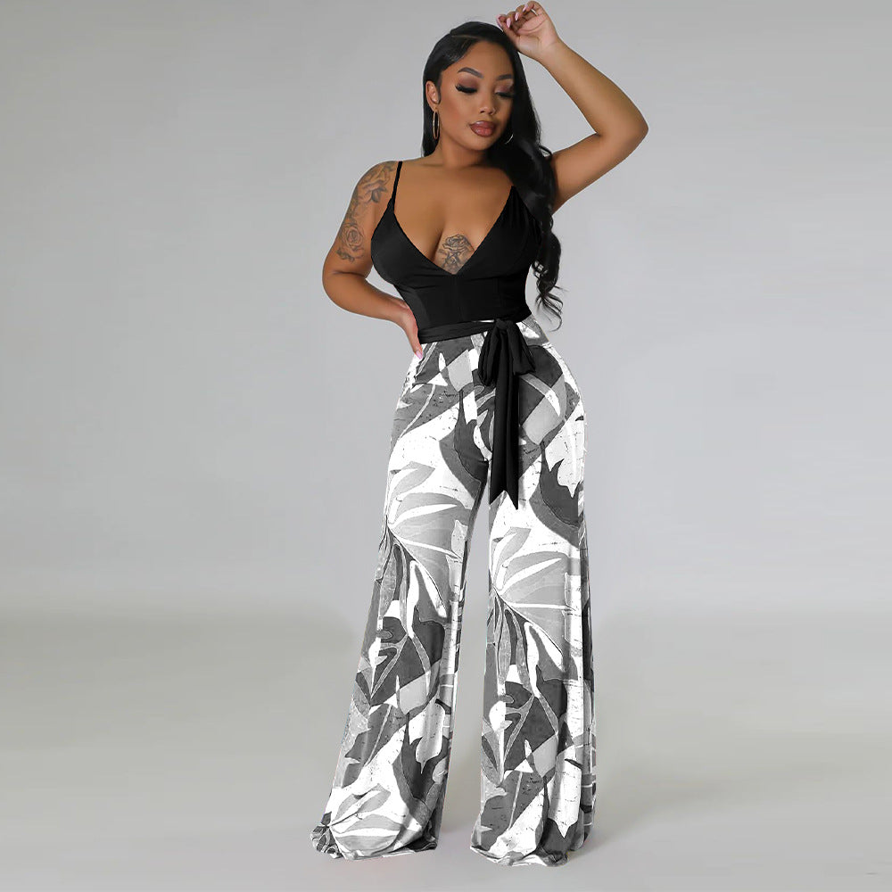 Dame Jumpsuit med flydende snit og elegant taljering Stilla