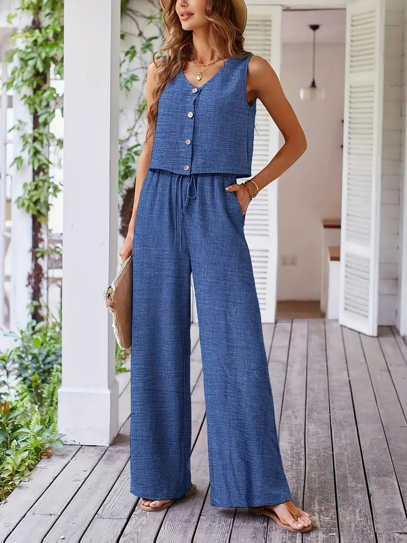 Dame leger jumpsuit med knaplukning og bredt ben Stilla