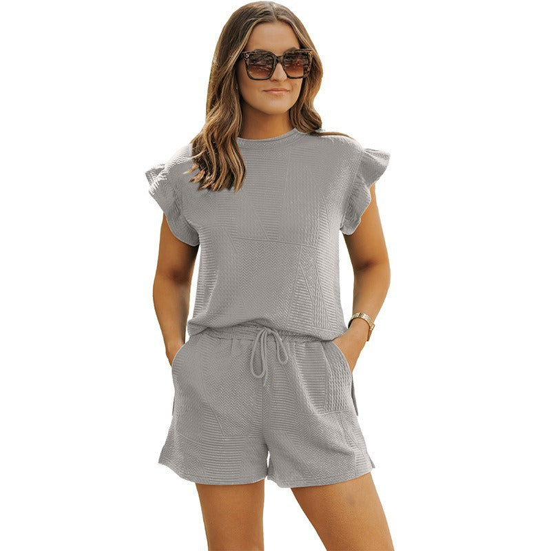 Dame afslappet jumpsuit med struktureret design og praktiske lommer Stilla