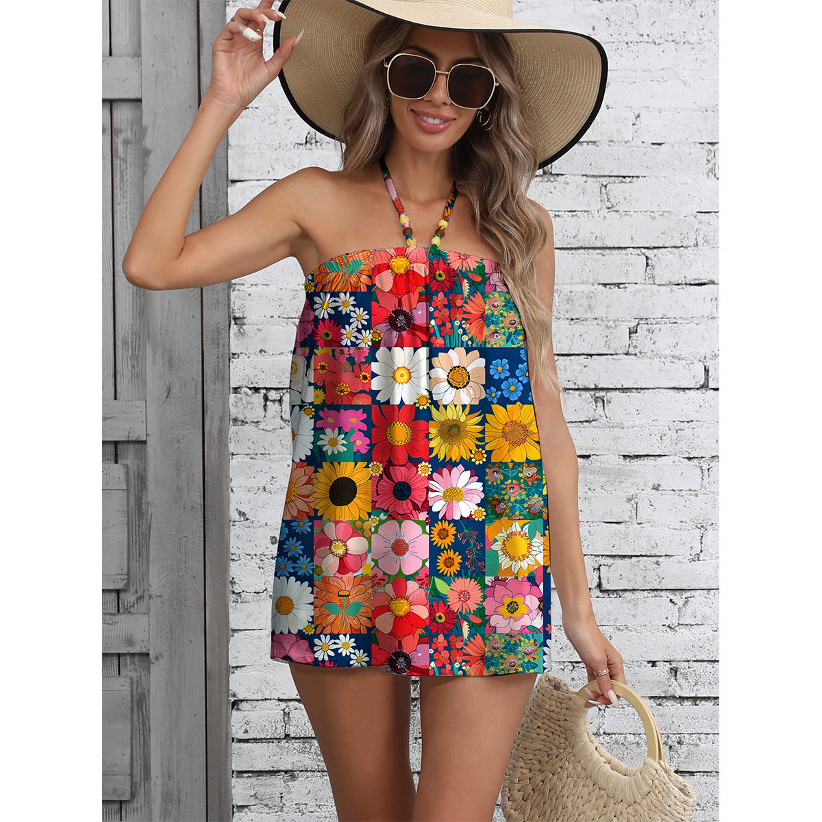 Dame Sommer Jumpsuit med farverigt blomsterdesign og stilfuldt bærerdesign Stilla