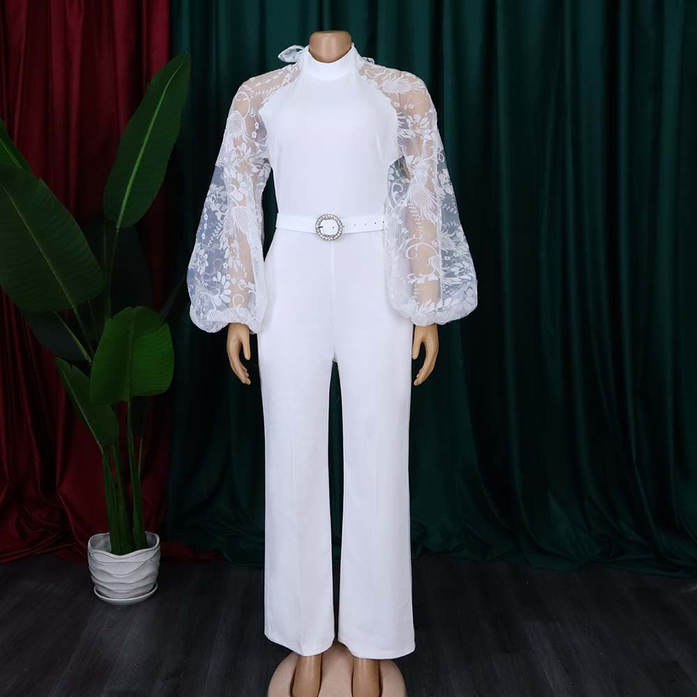 Dame jumpsuit med transparente puffærmer og taljerbar bælte Stilla