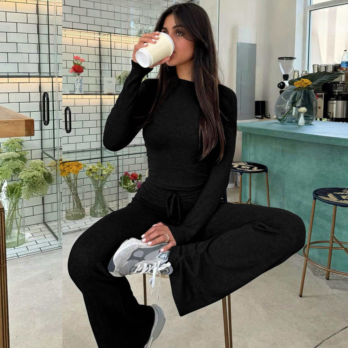 Dame Behagelig Langærmet Jumpsuit med flagrende ben og elastisk talje Stilla
