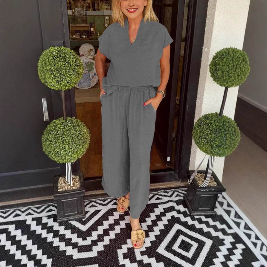 Dame jumpsuit med løs pasform og elegant V-udskæring Stilla