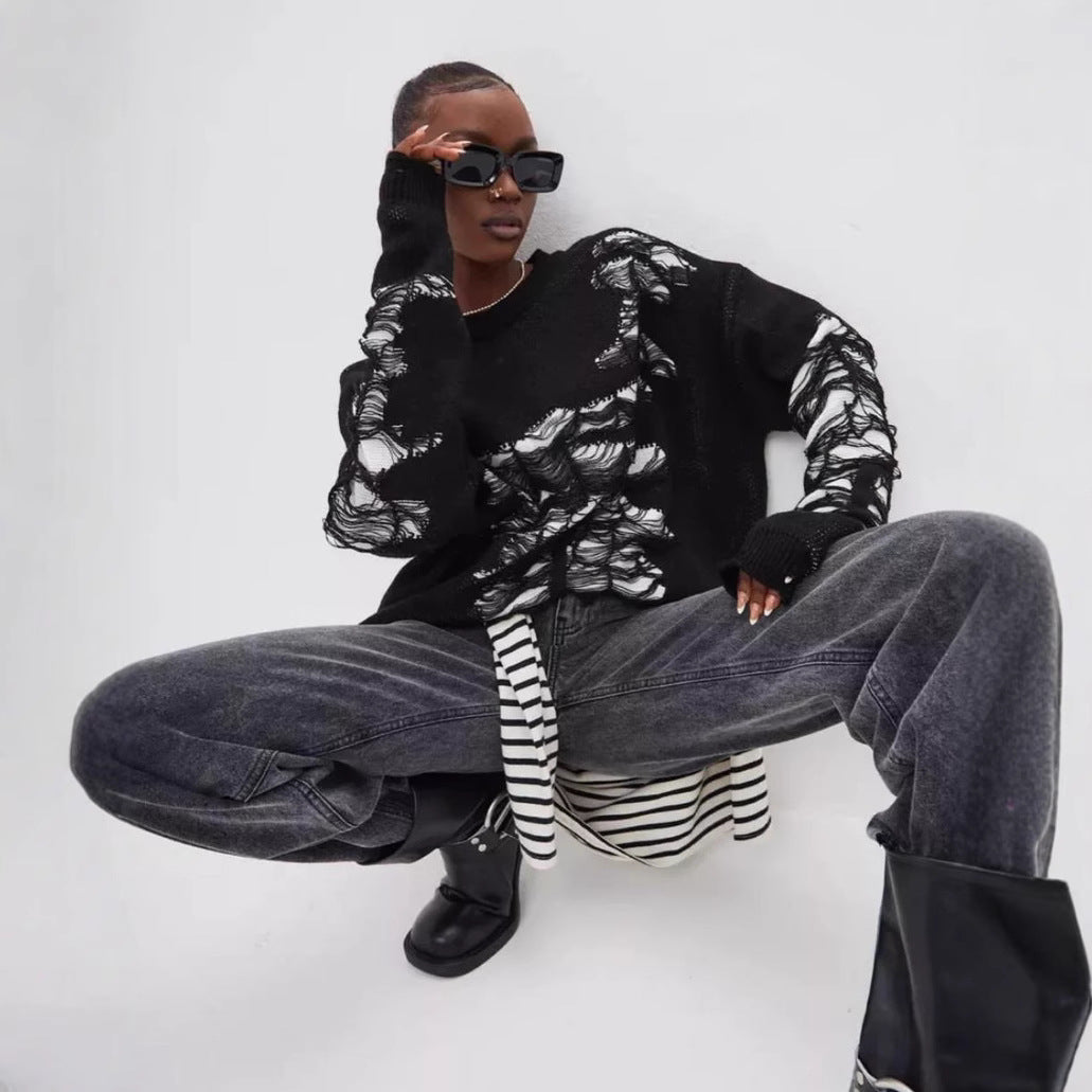 Damer groft strikket oversized sweater med unik transparensstruktur og moderne accenter Stilla
