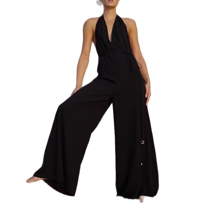 Dame jumpsuit med dyb V-udskæring og bredt ben Stilla