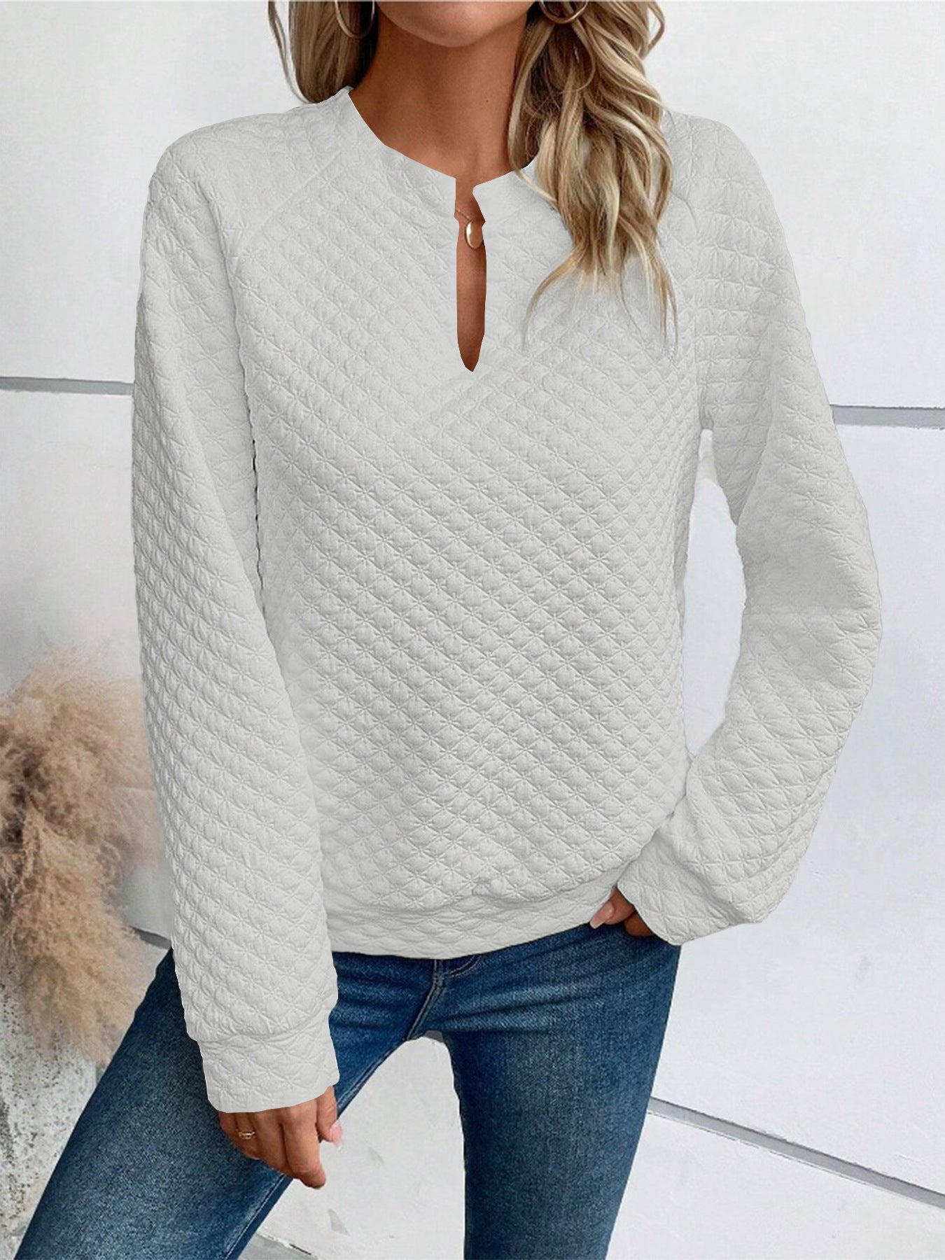 Damer quiltet pullover med slids Stilla