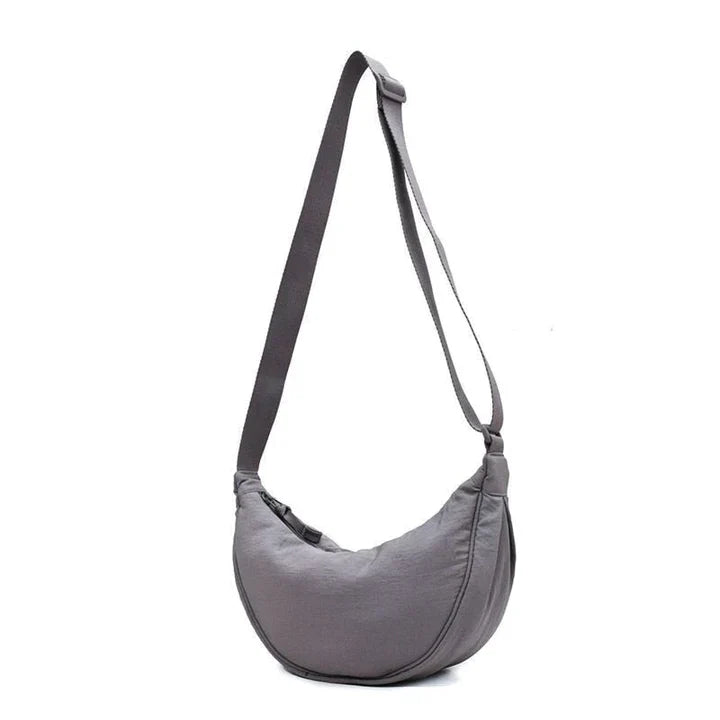 Stilla | Halvmåne crossbody taske med blomstermønster