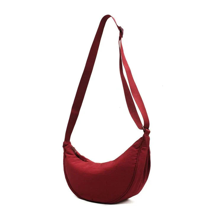 Stilla | Halvmåne crossbody taske med blomstermønster