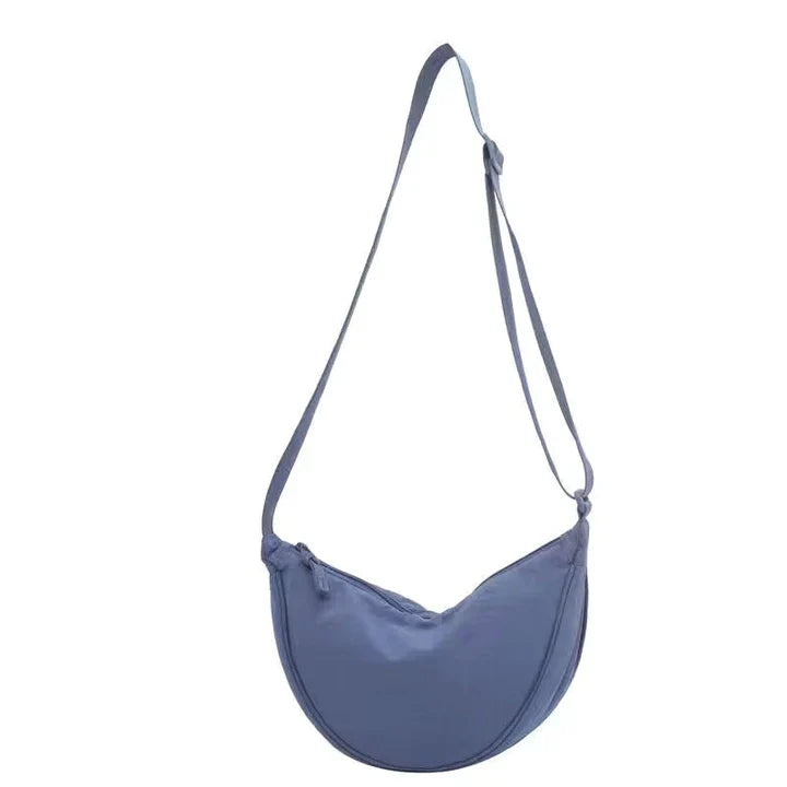 Stilla | Halvmåne crossbody taske med blomstermønster