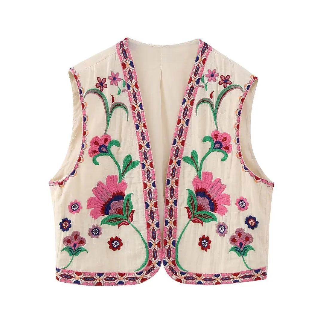 Stilla | Broderet ærmeløs vest med blomsteraccenter