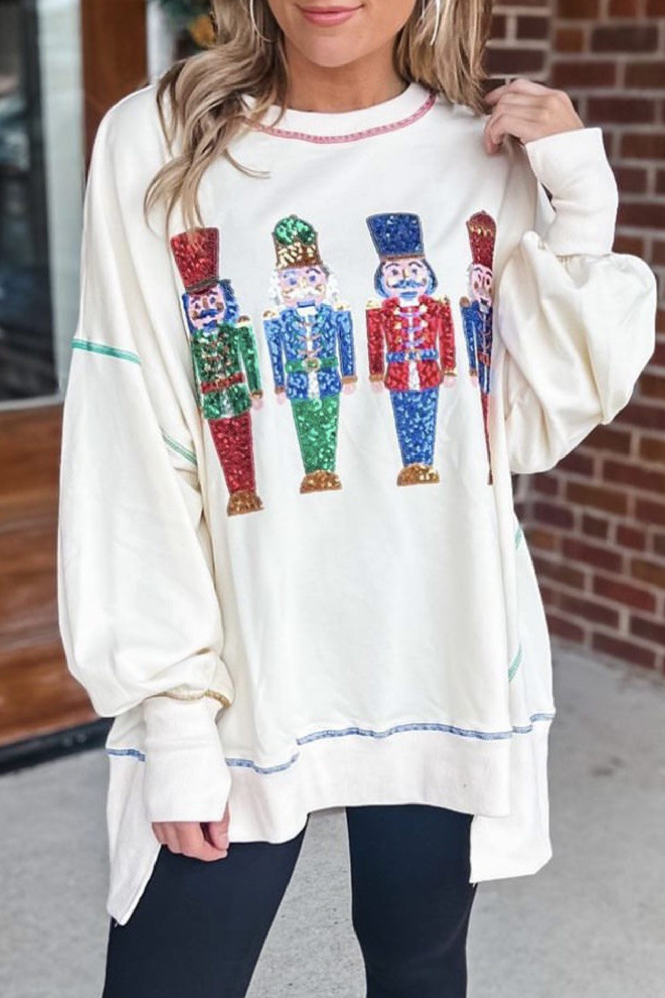 Stilla | Sweatshirt med paillette grafik og slidsbund