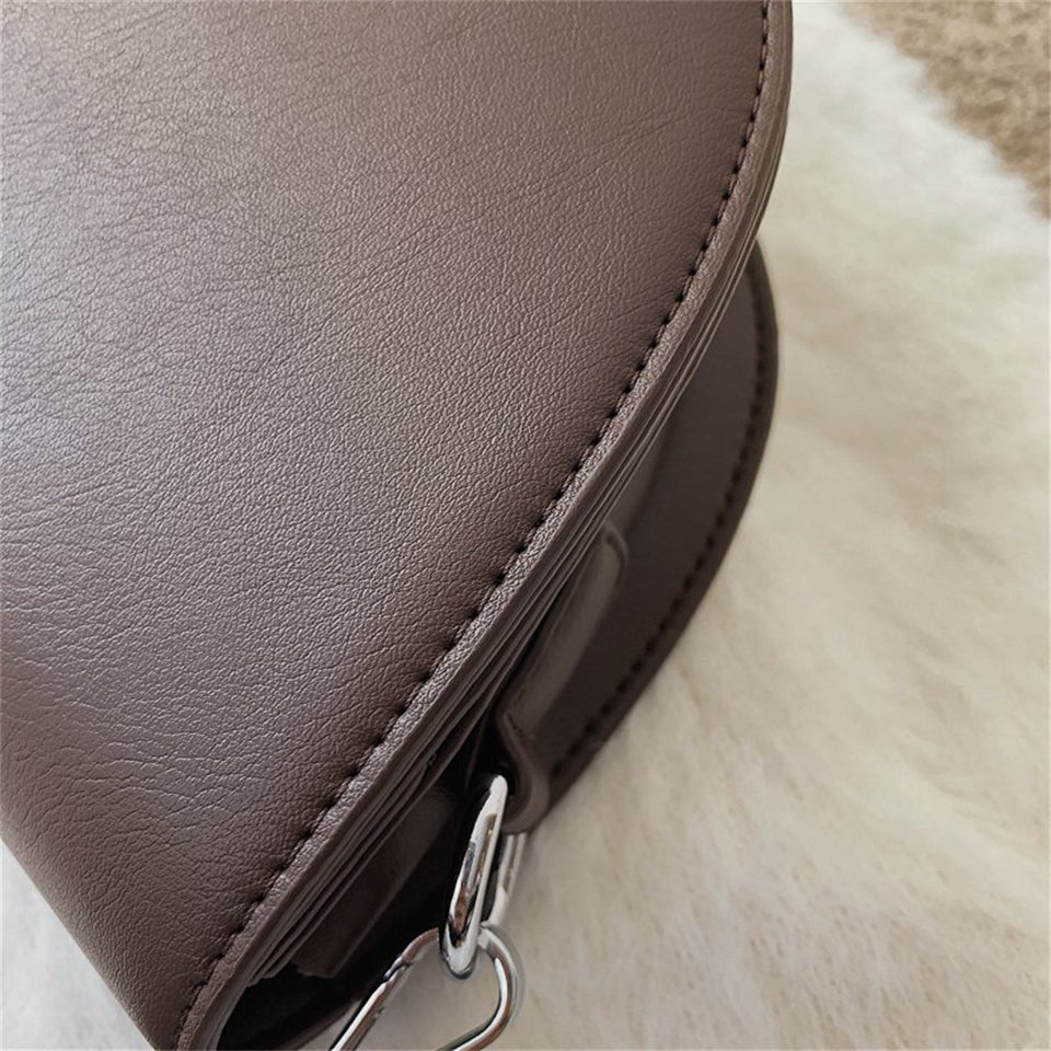 Stilla | taske til damer "Saddle"