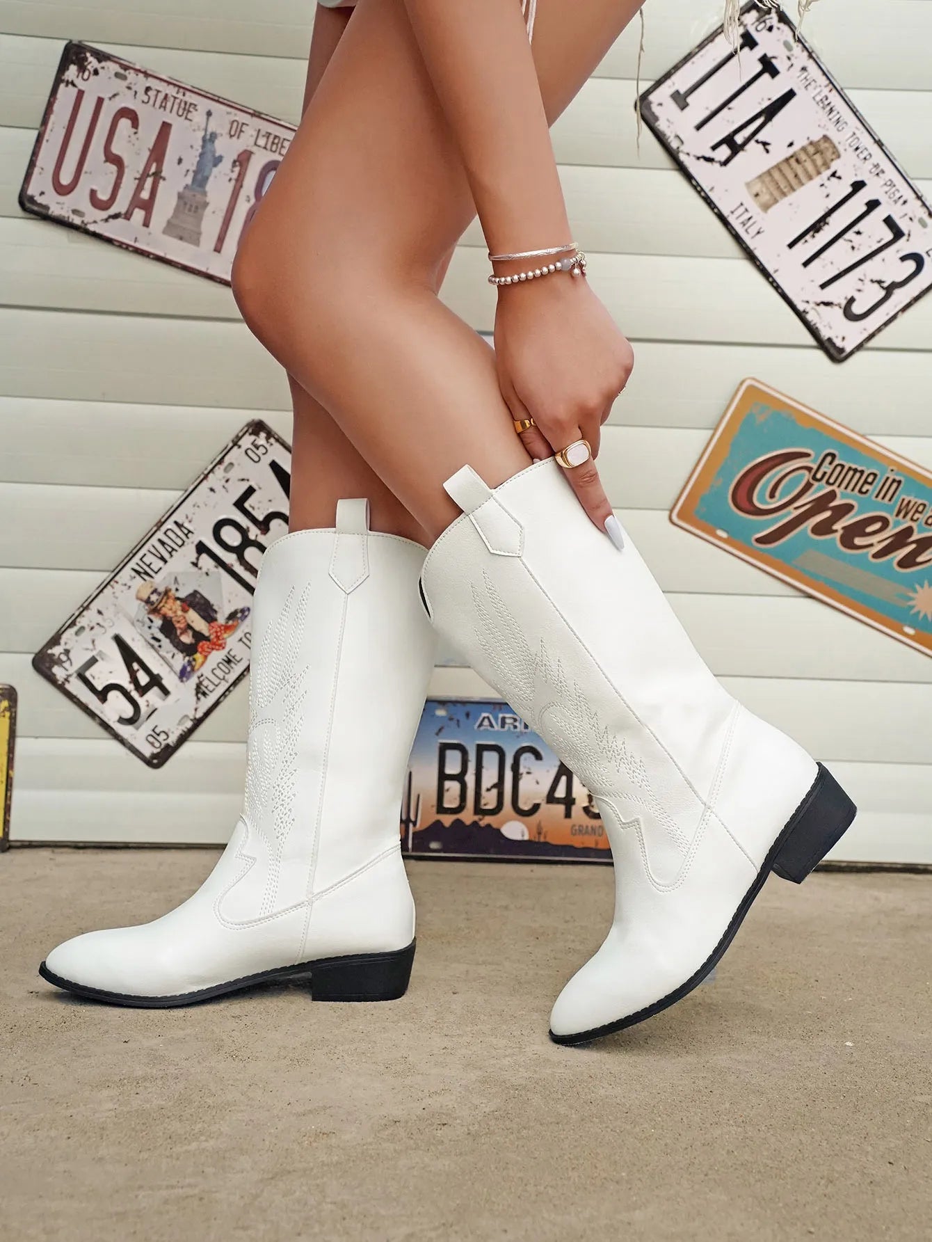 Stilla | Skinnende cowboystøvler i metallic-look