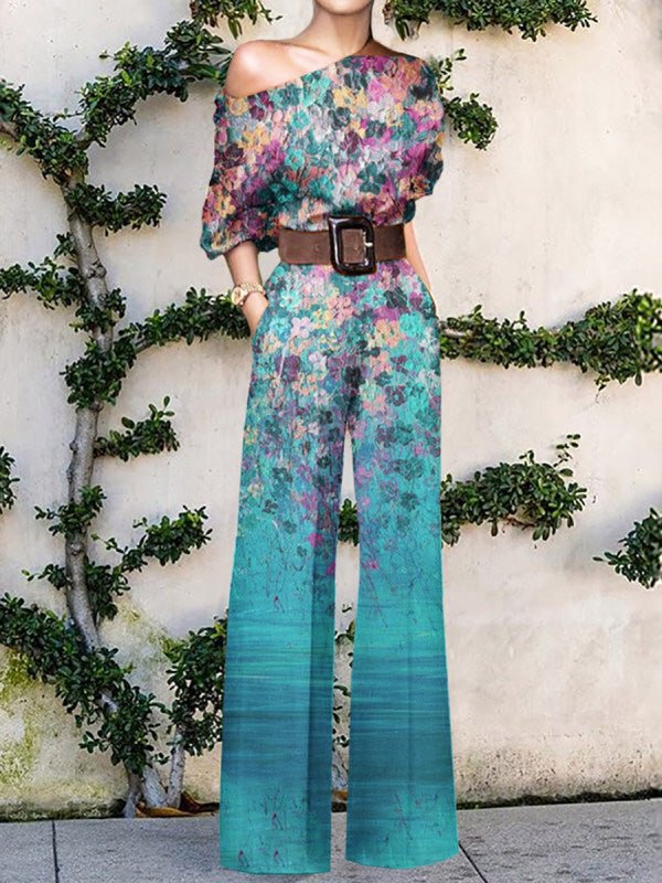 Stilla | Bred Ben Jumpsuit med Skrå Skulder og Print