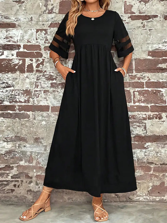 Stilla | Elegant Kjole Med Halvmilede Ærmer Og Elegant Mesh Syning
