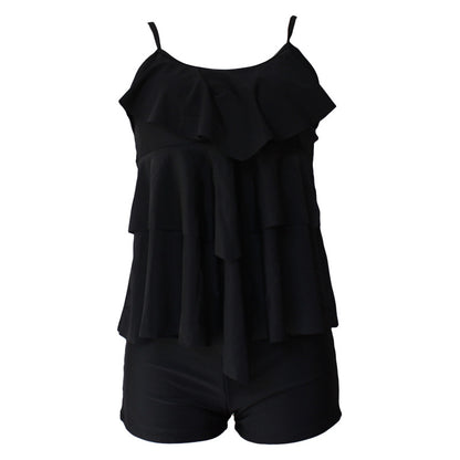 Dame badedragt med voluminøst flæsedesign og shorts Stilla