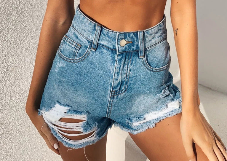 Dame Destroyed Denim-Shorts med høj talje og frynset afslutning Stilla
