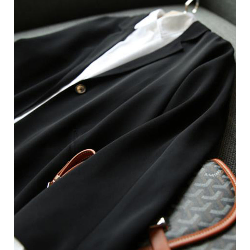 Dame afslappet oversized blazer med gennemgående knaplukning og to lommer Stilla