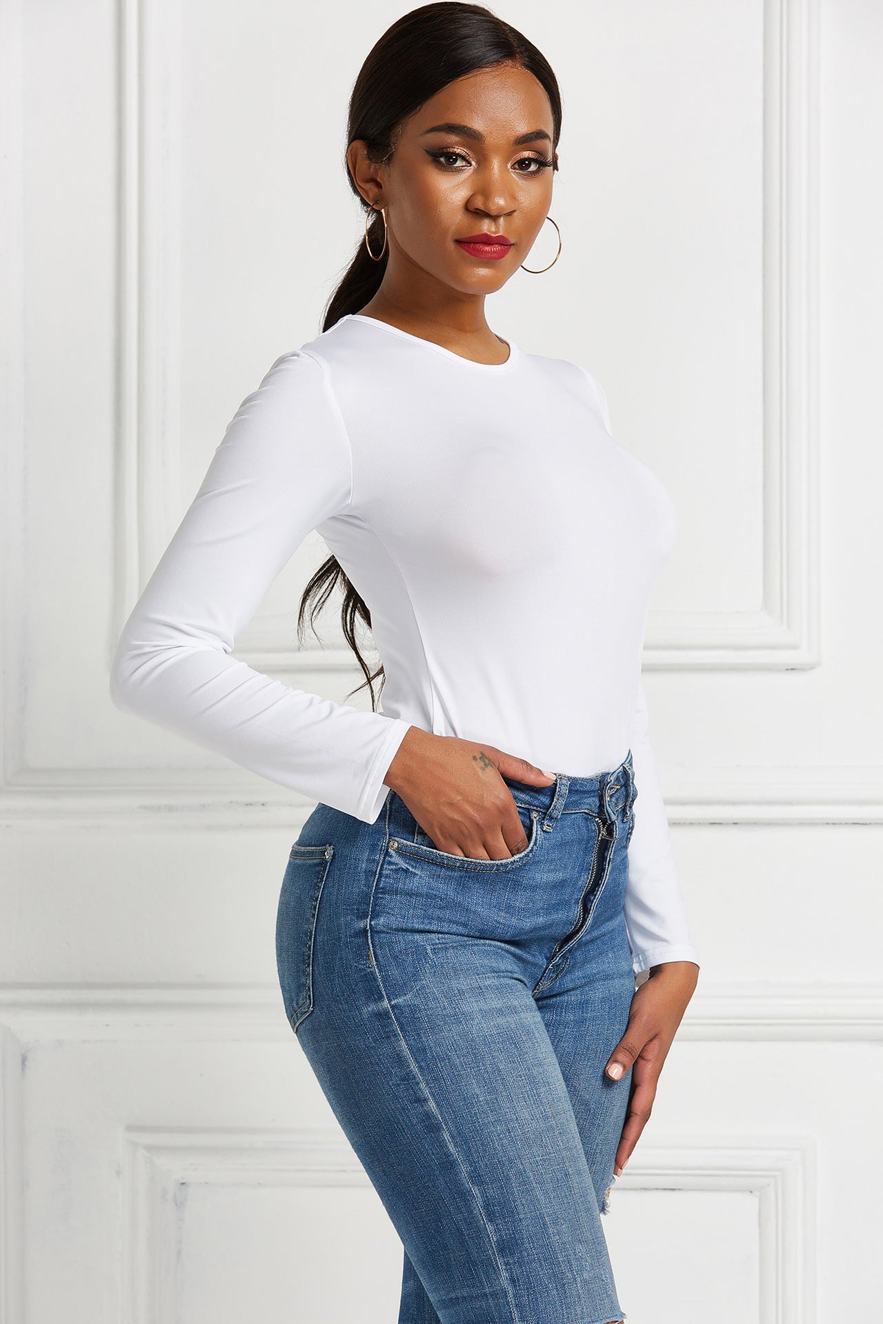 Damer Langærmet Bodysuit med figursyende snit og elegant Rundhalset Stilla