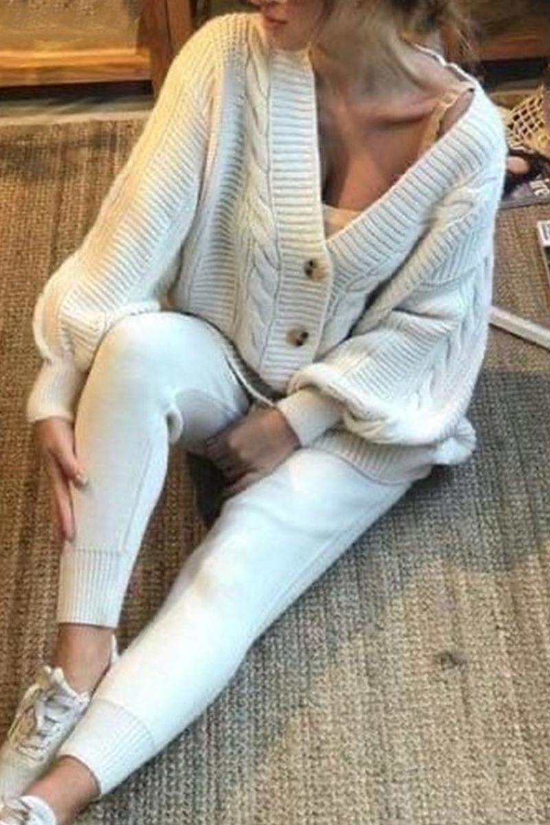 Stilla | To-delt Casual Patchwork Jumpsuit Med V-hals og Lange Ærmer