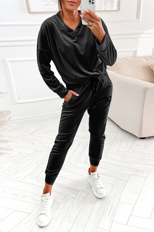 Stilla | Læder Løs To-delt Jumpsuit Med Fast Bremse, V-hals og Lange Ærmer