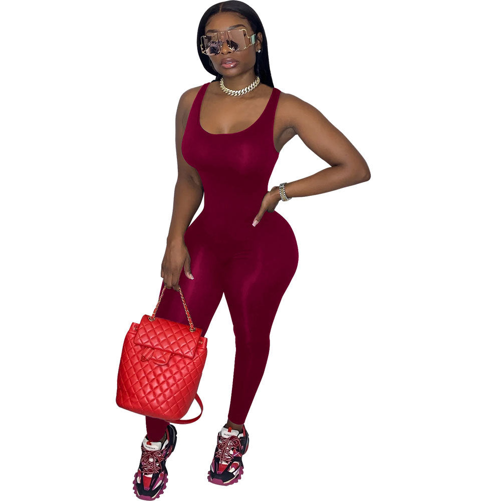 Dame tætsiddende sport-langeærmet jumpsuit med rund halsudskæring Stilla