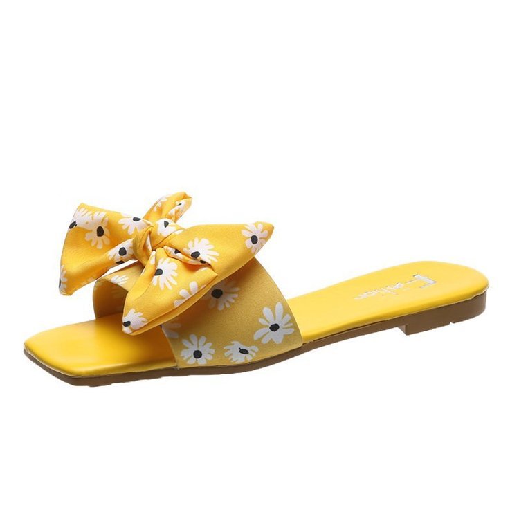 Dame fashionable slippers med legende blomsterdesign og elegante sløjfer Stilla