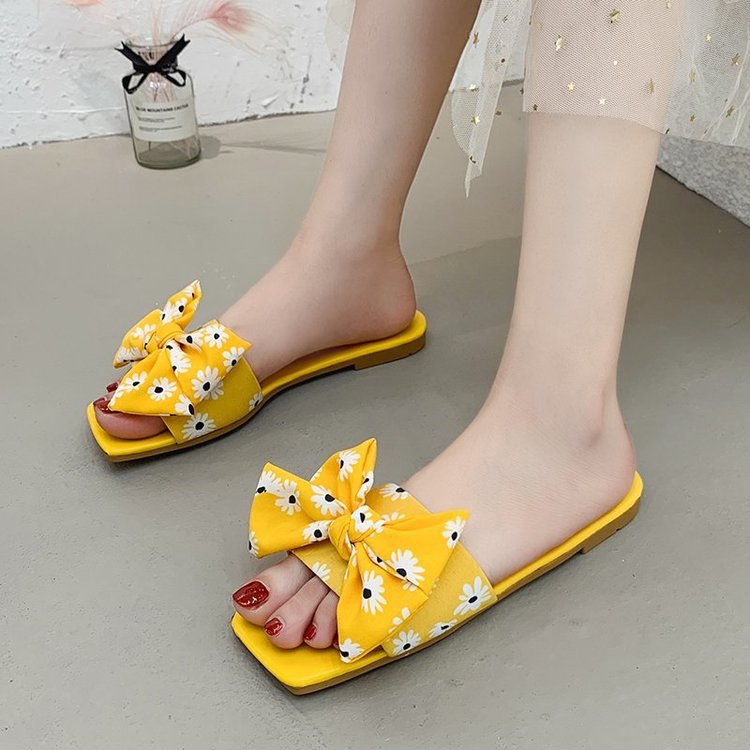 Dame fashionable slippers med legende blomsterdesign og elegante sløjfer Stilla
