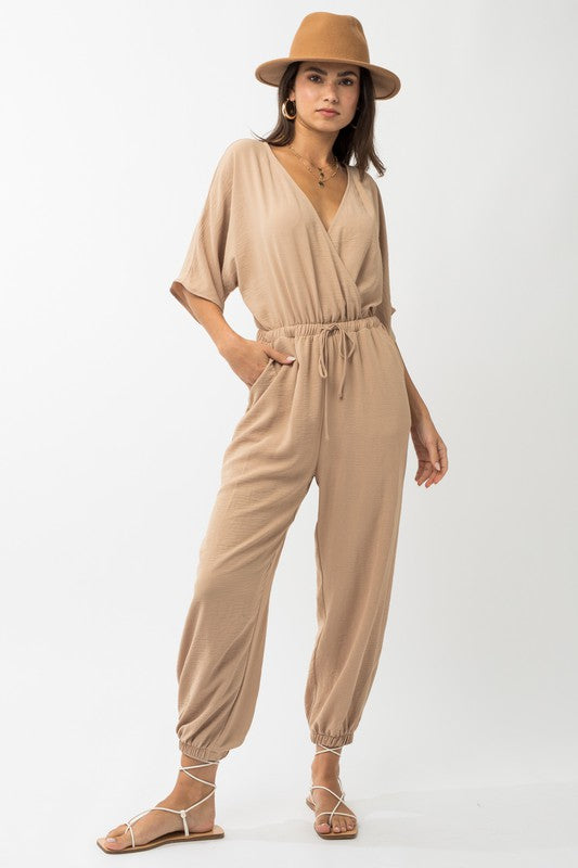 Stilla | Ærme Surplice Jumpsuit