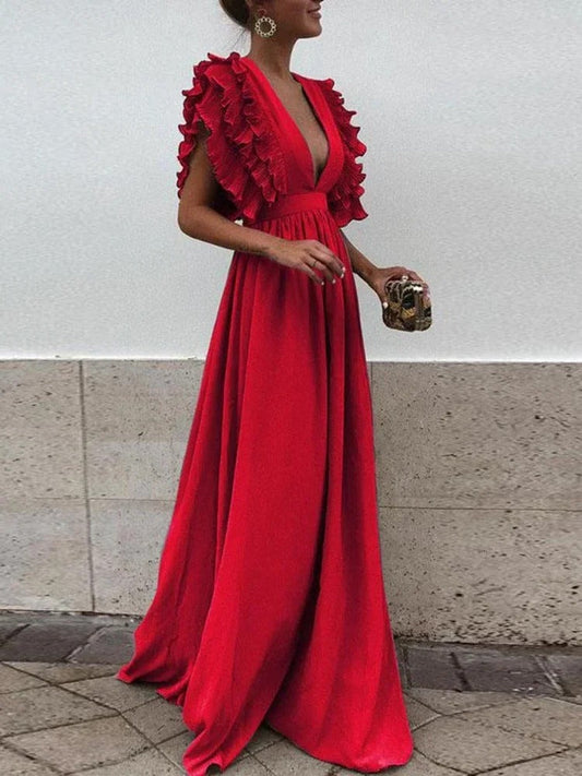 Stilla | Elegant Kjole Med V-Hals Og Voluminøse Ærmer Til Et Stilfuldt Look