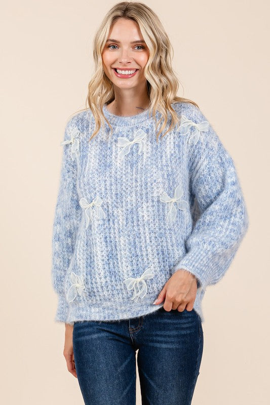 Stilla | Pullover af groft strik med broderet knude