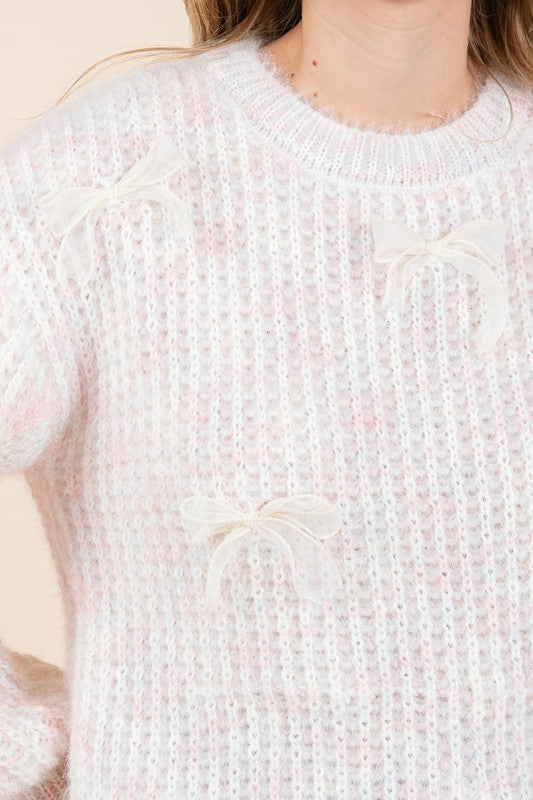 Stilla | Pullover af groft strik med broderet knude
