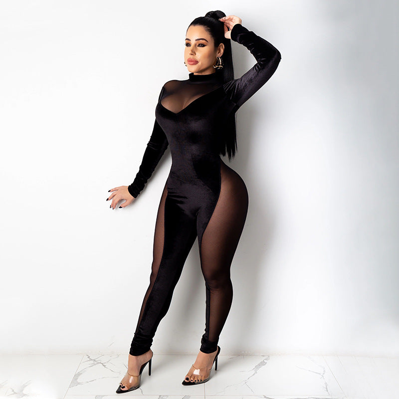 Dame figursyet jumpsuit med gennemsigtige indsatser og elegant ståkrave Stilla
