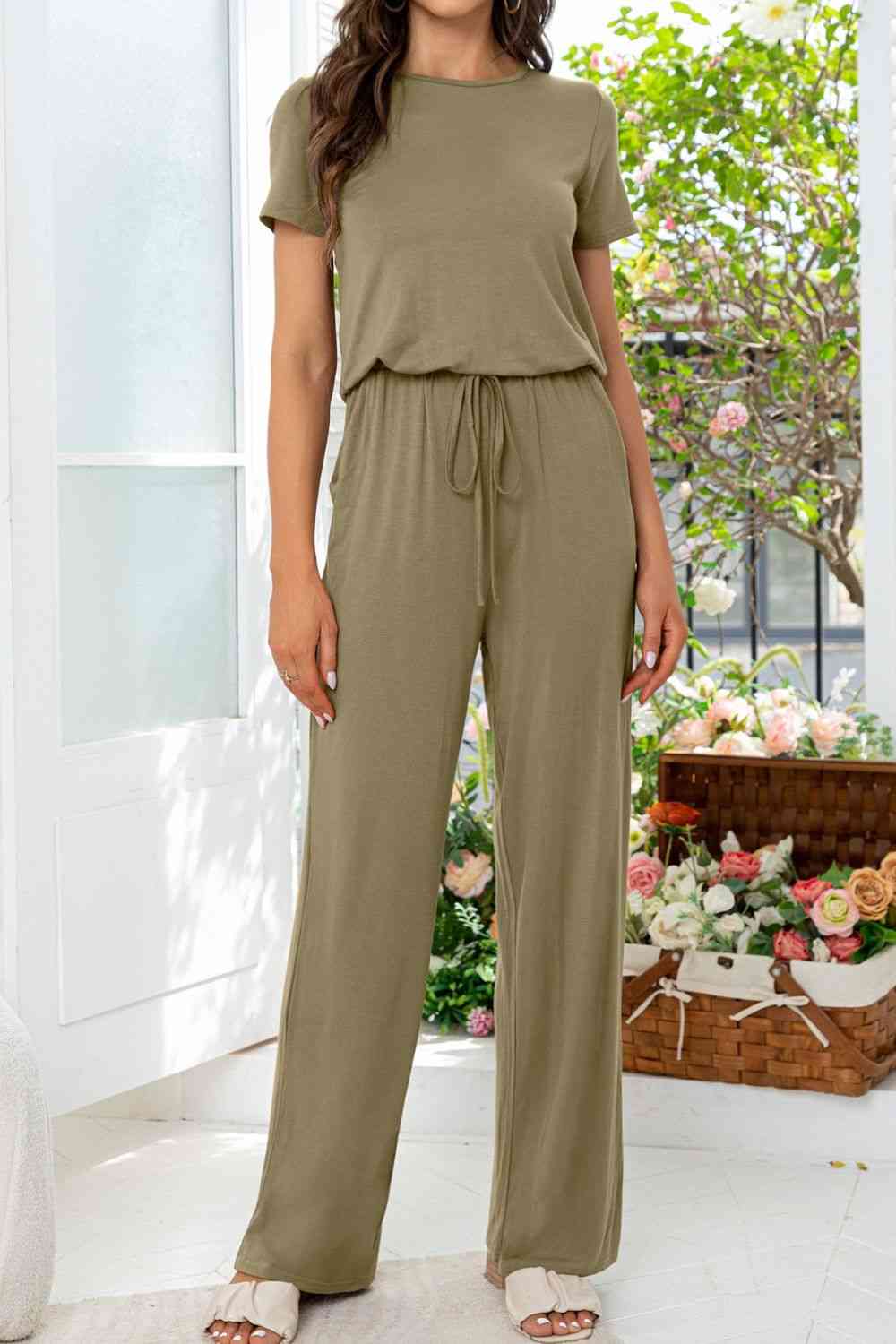 Stilla | Hals Åben Bag Jumpsuit Med Lommer