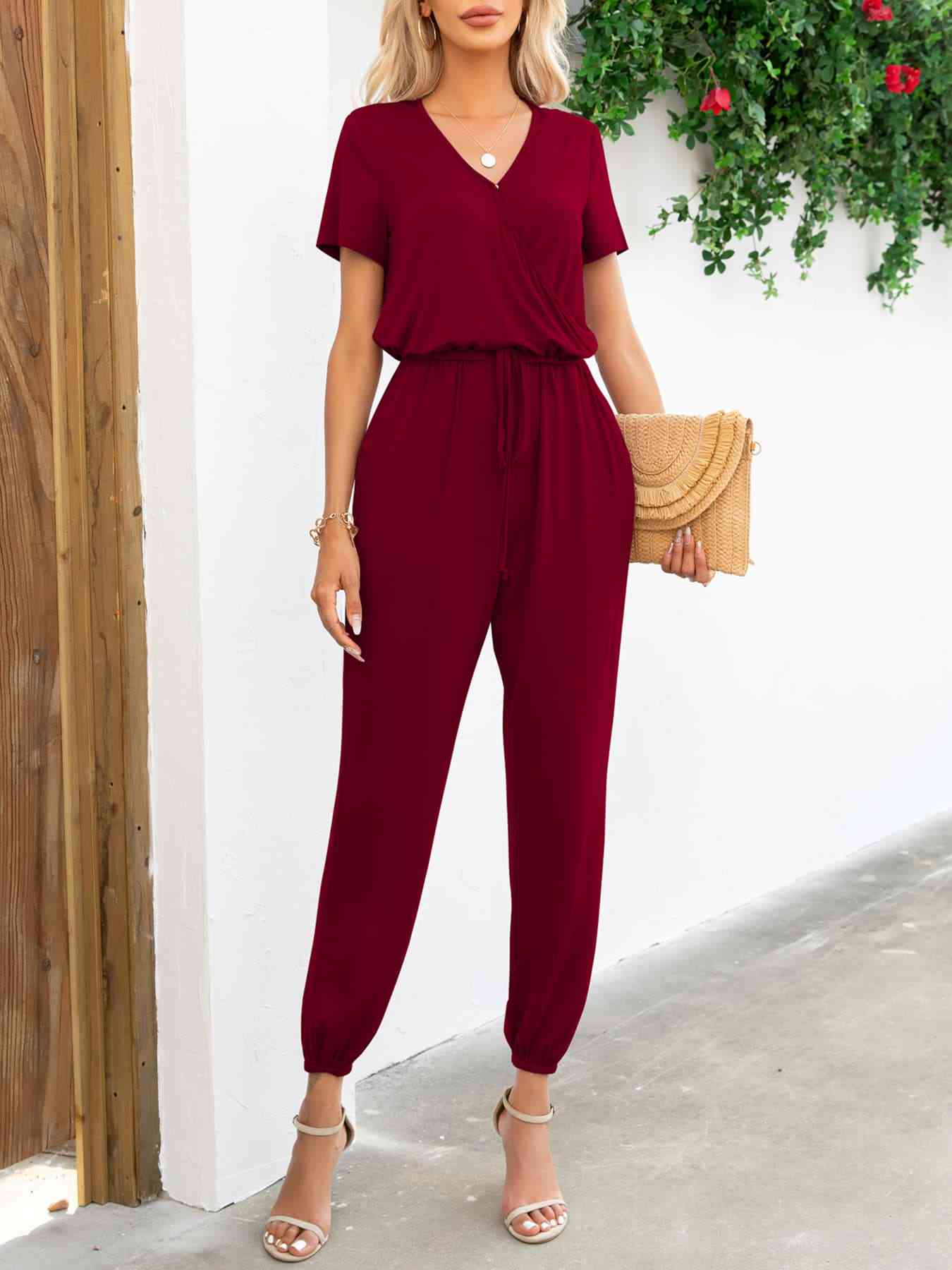 Stilla | Ærme V-hals Jumpsuit Med Lommer
