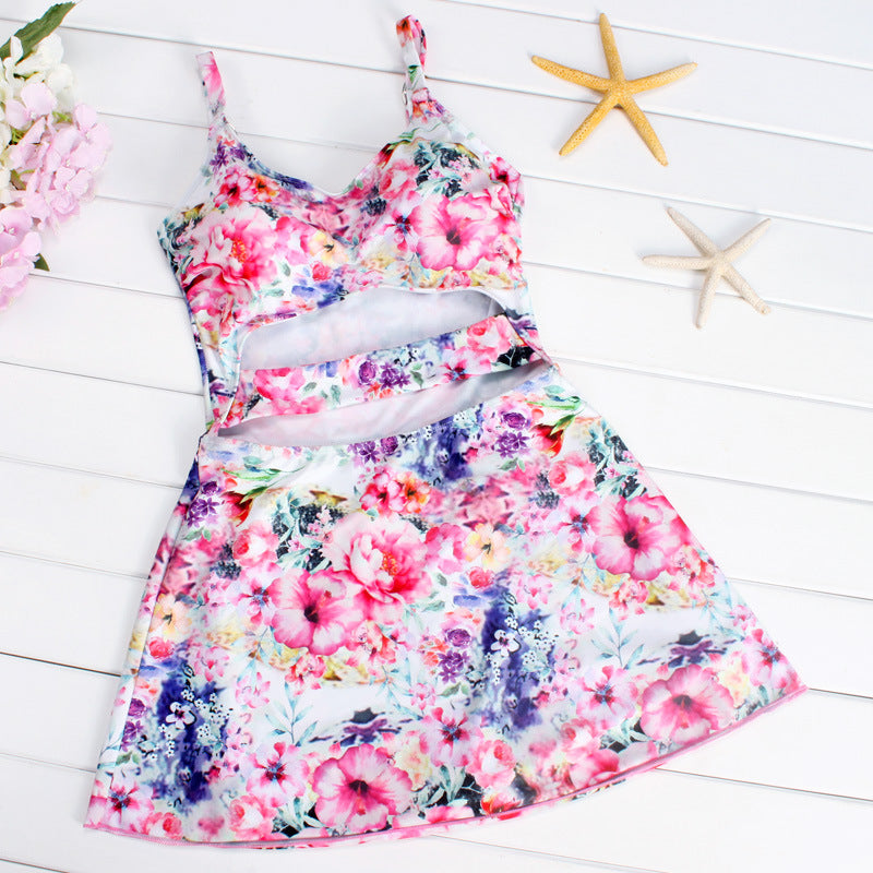 Dame Cut-Out Badedragt med blomstret design og legesyg skørt Stilla