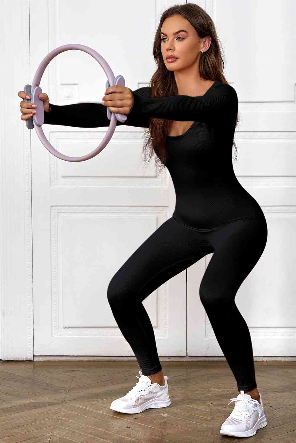 Stilla | Ermeløs Scoop Neck Skinny Jumpsuit