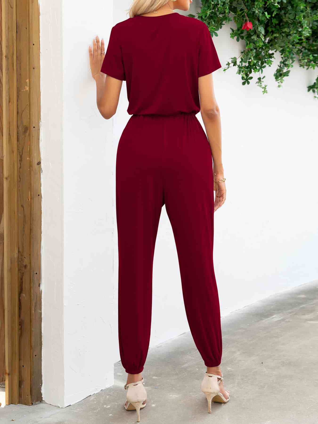 Stilla | Ærme V-hals Jumpsuit Med Lommer