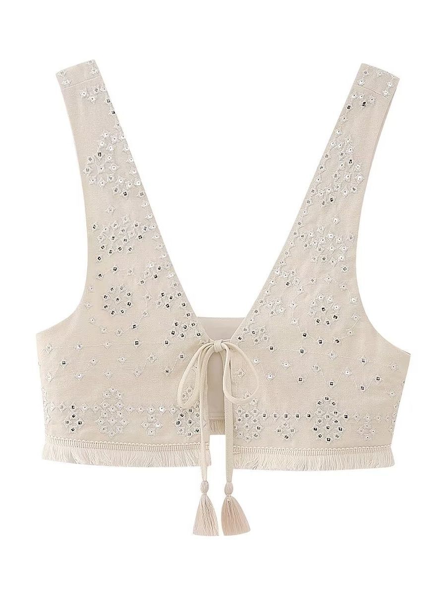 Stilla | Kort fritidsvest til kvinder om foråret med broderi og sløjfe