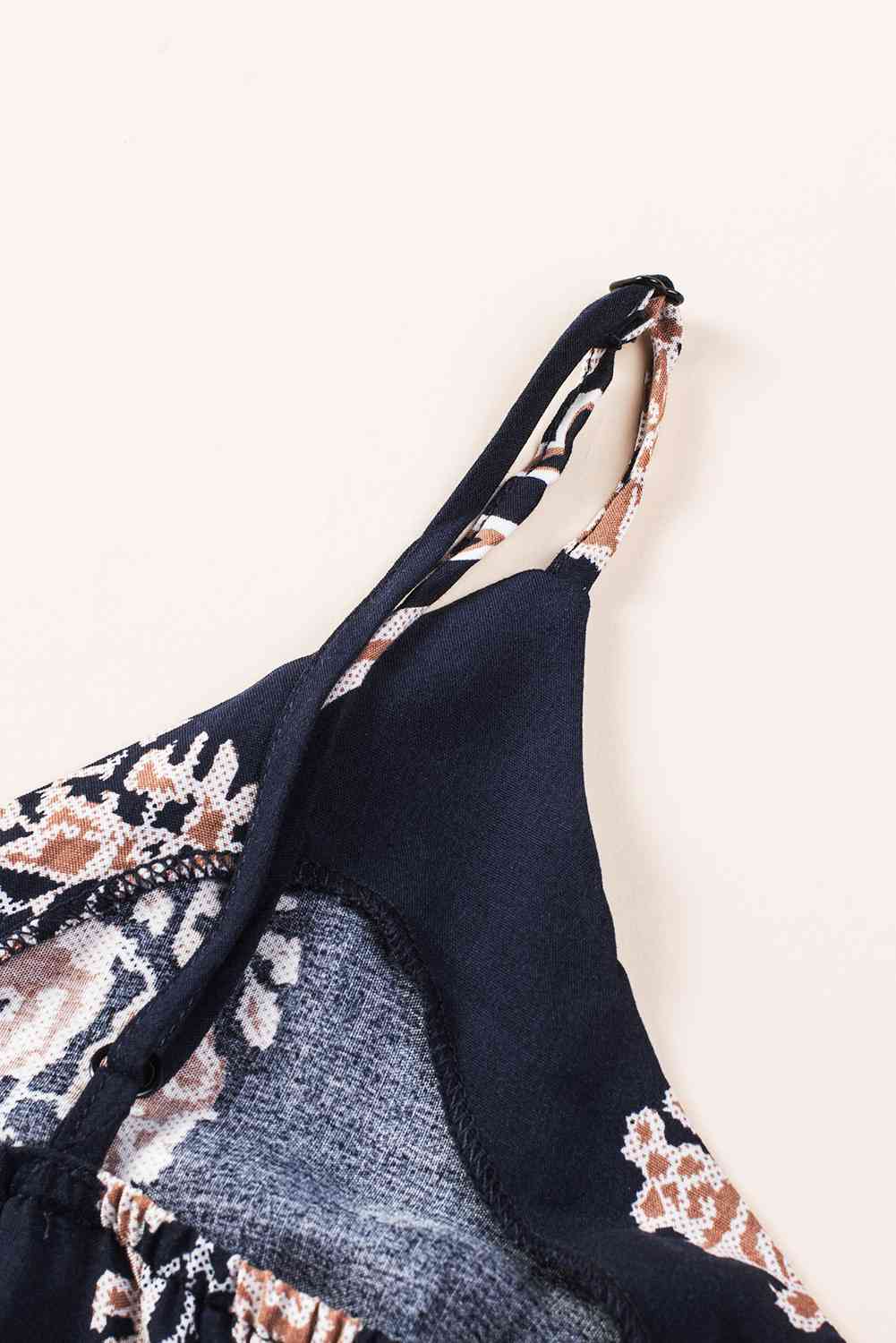 Stilla | V-hals ærmeløs jumpsuit