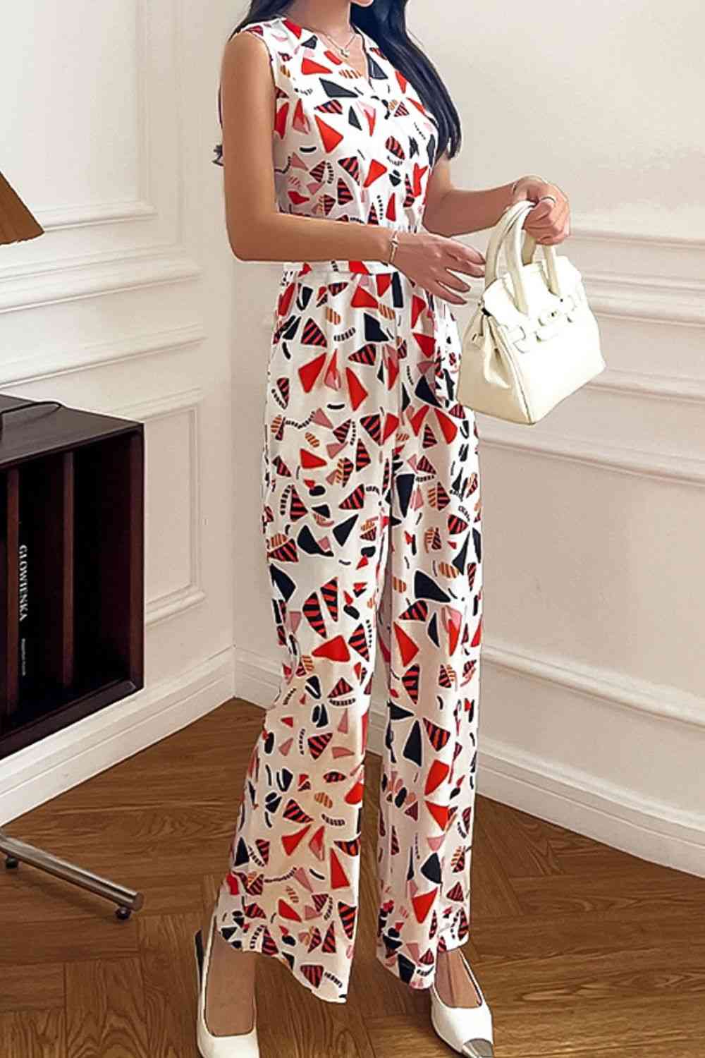 Stilla | Surplice hals ærmeløs jumpsuit