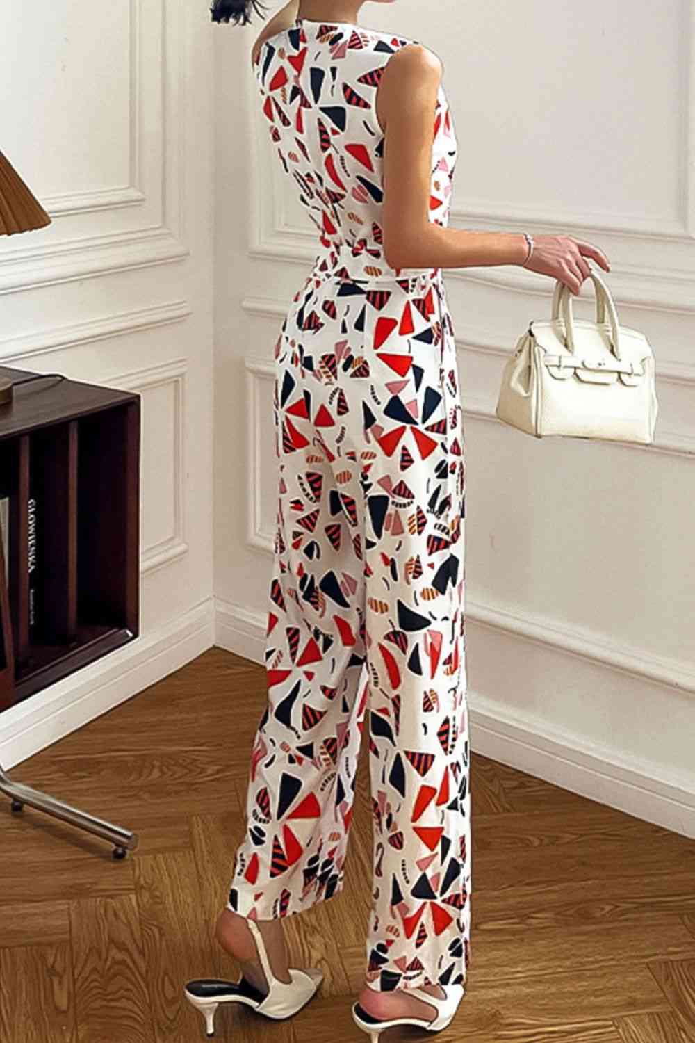Stilla | Surplice hals ærmeløs jumpsuit