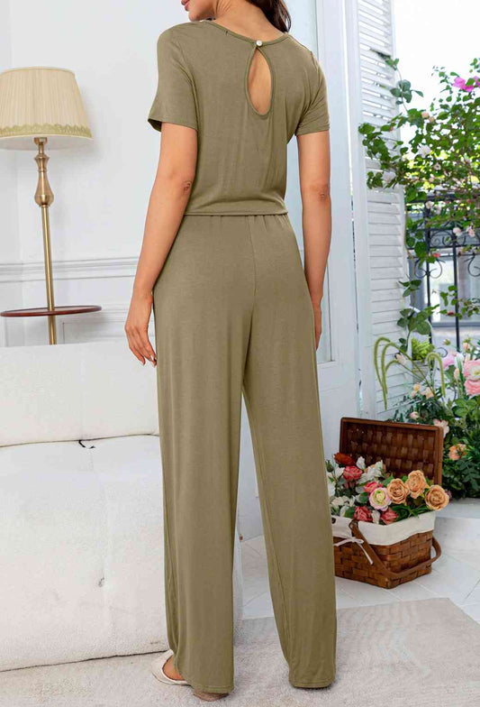 Stilla | Hals Åben Bag Jumpsuit Med Lommer