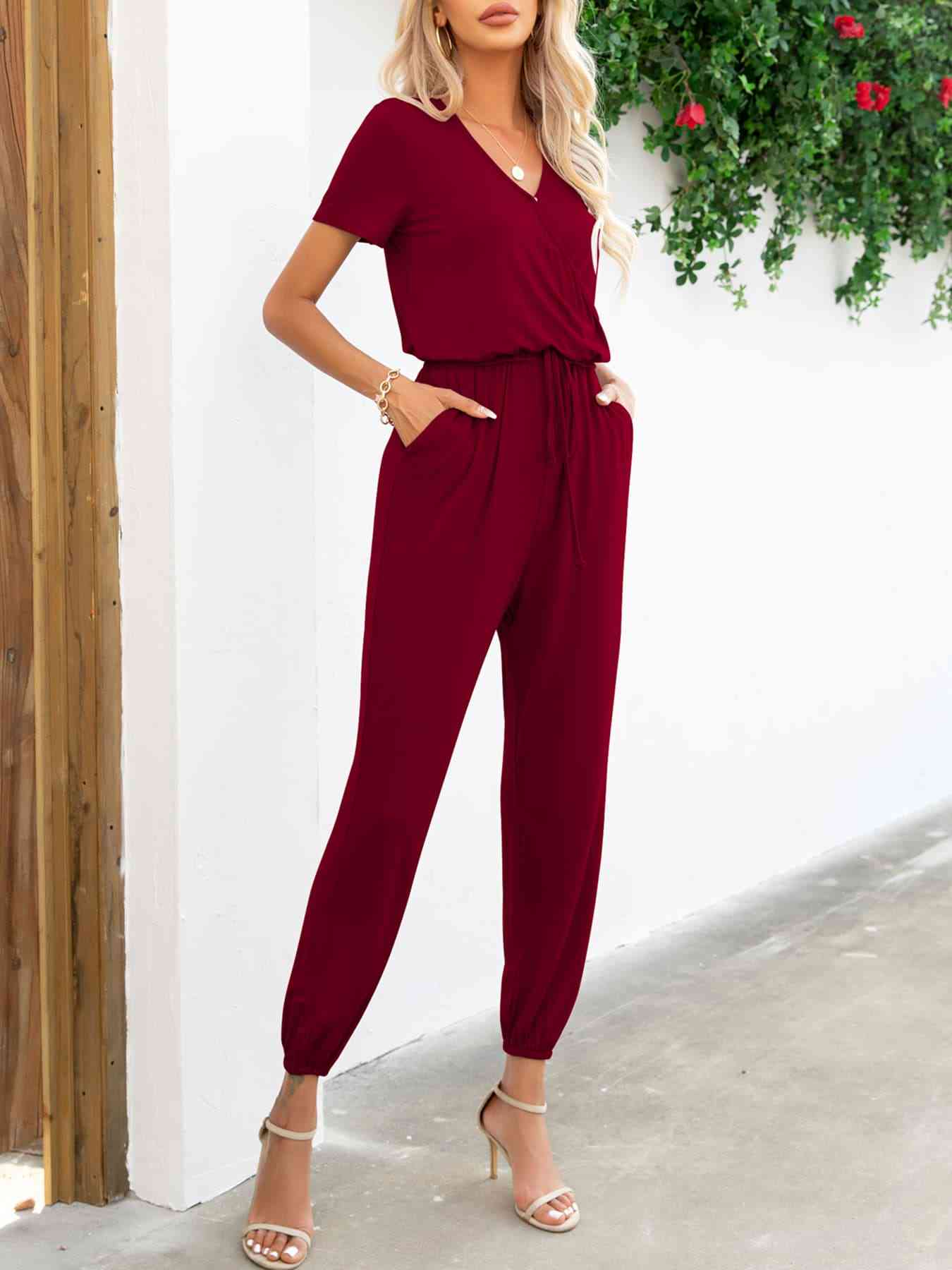 Stilla | Ærme V-hals Jumpsuit Med Lommer