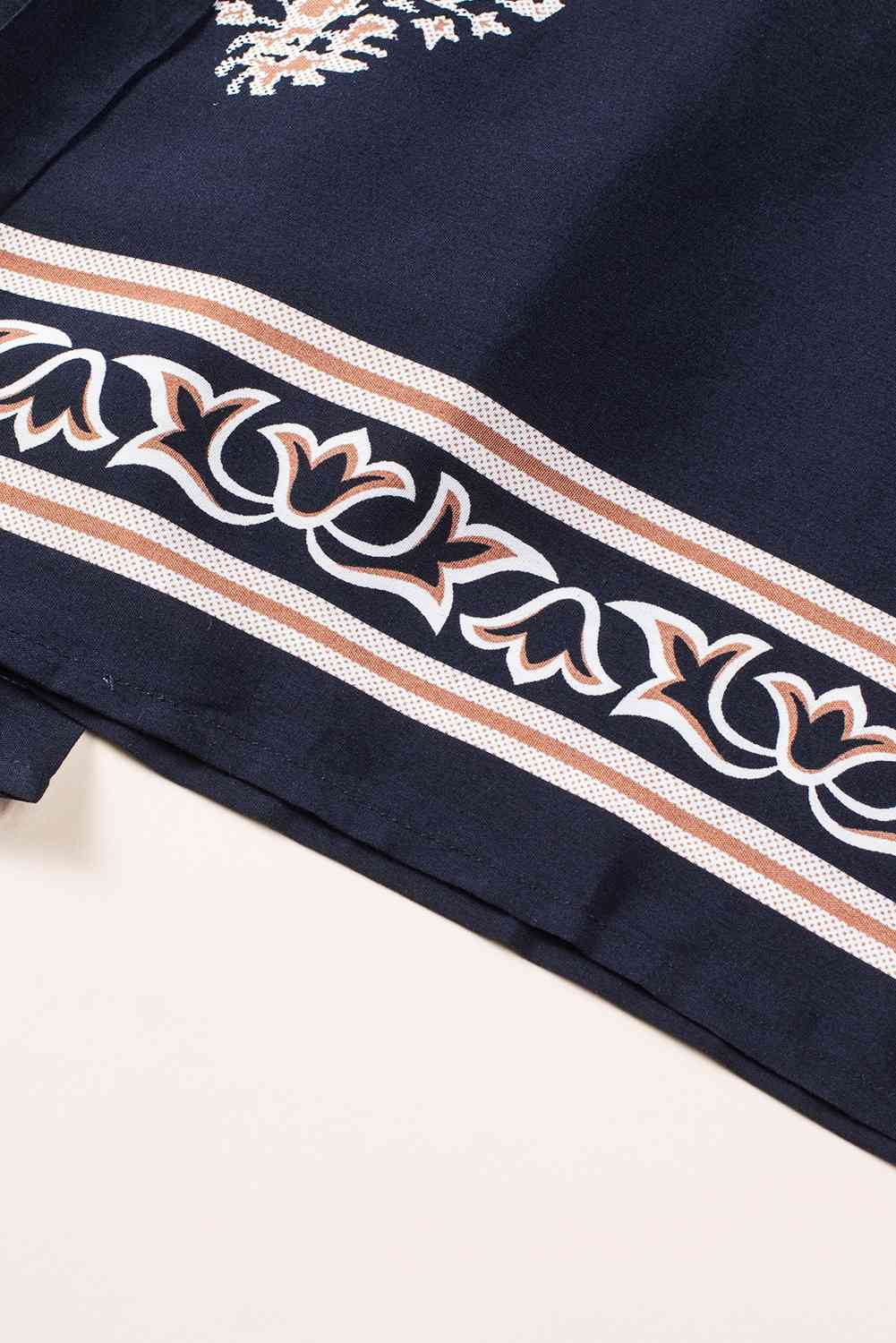 Stilla | V-hals ærmeløs jumpsuit