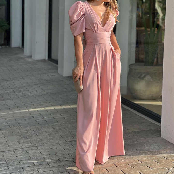 Stilla | Elegant V-udskæring Jumpsuit med puffærmer til stilfulde kvinder